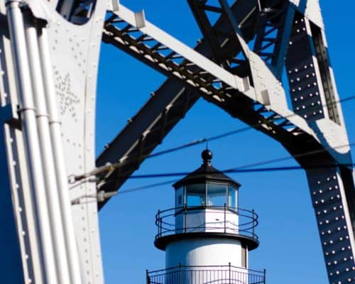 Lift Bridge with Lighthouse in the Background