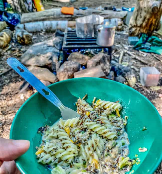 Enjoying Dinner by the Campfire